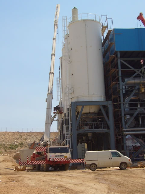 Dewatered sludge silos with feeding and descharge equipments in a waste water treatment plant