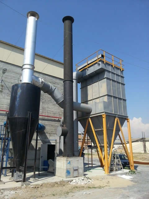 Dedusting a biomass fired boiler