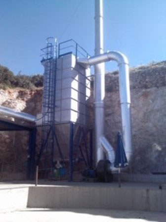 Dedusting a biomass fired boiler in an industrial laundry