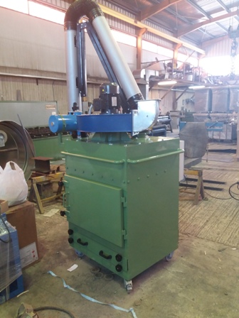 Portable filter with extraction arm